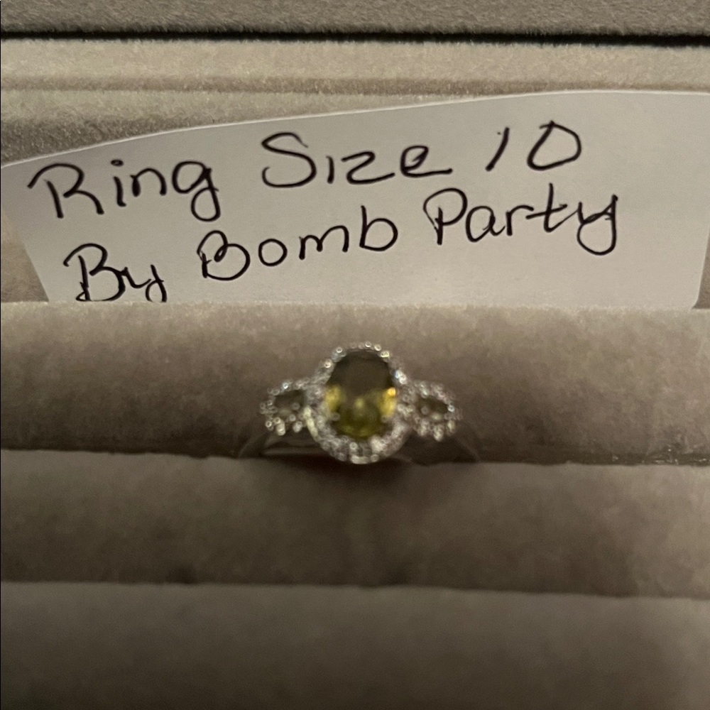 Silver and light green gemstone Ring